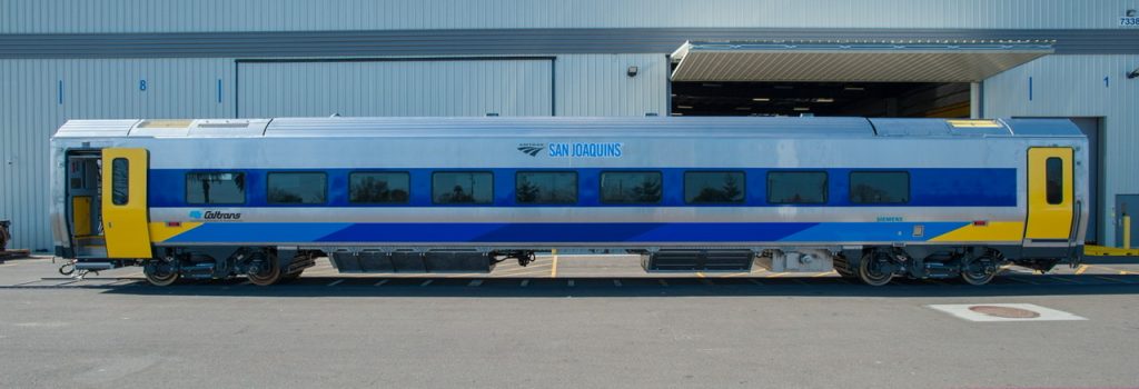 Venture coach in Amtrak San Joaquins livery. (State of California)