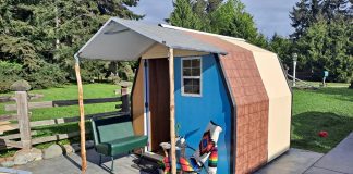 A view of a tiny house creation with a front porch from LiteHouse Shelters.