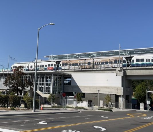 A Transit Rider’s Guide to the Northgate Link Light Rail Extension A photo of an elevated Link light rail line over a street.