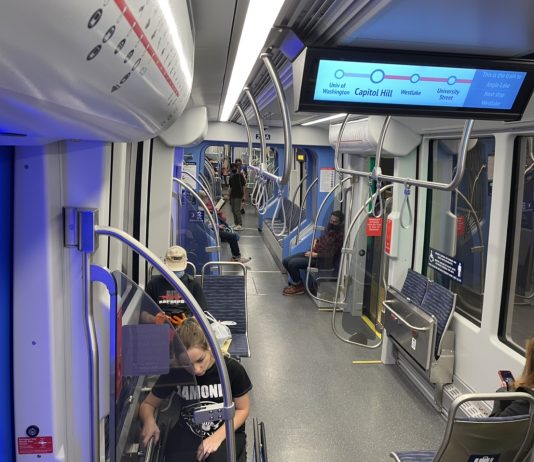 Sound Transit Moving Forward on Purchase of 10 More Link Cars A photo of the interior of the light rail car showing the seating area.