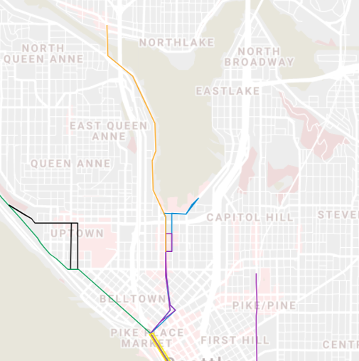 A map of the north end of Downtown Seattle showing streetcar routes extending through Belltown into Queen Anne and South Lake Union toward Fremont. 