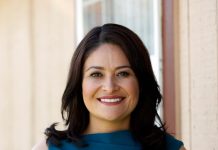 The Urbanist’s 2021 General Endorsements Lorena González wears a blue dress and has long brown hair.