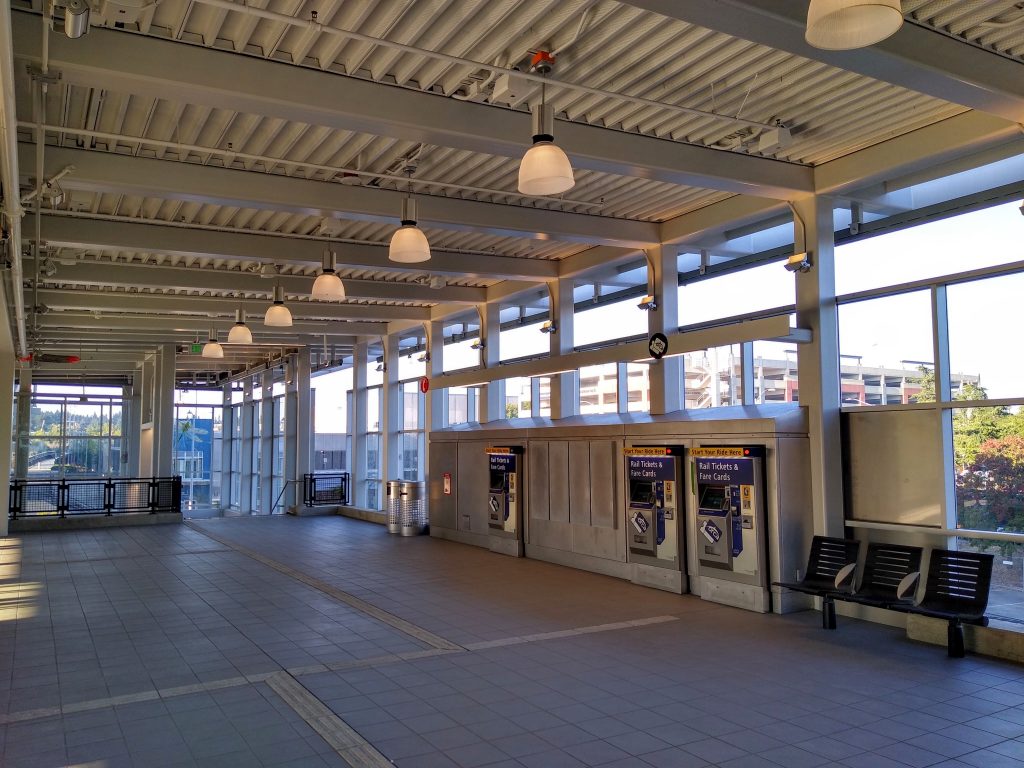 Station mezzanine with ticket vending machines and seating