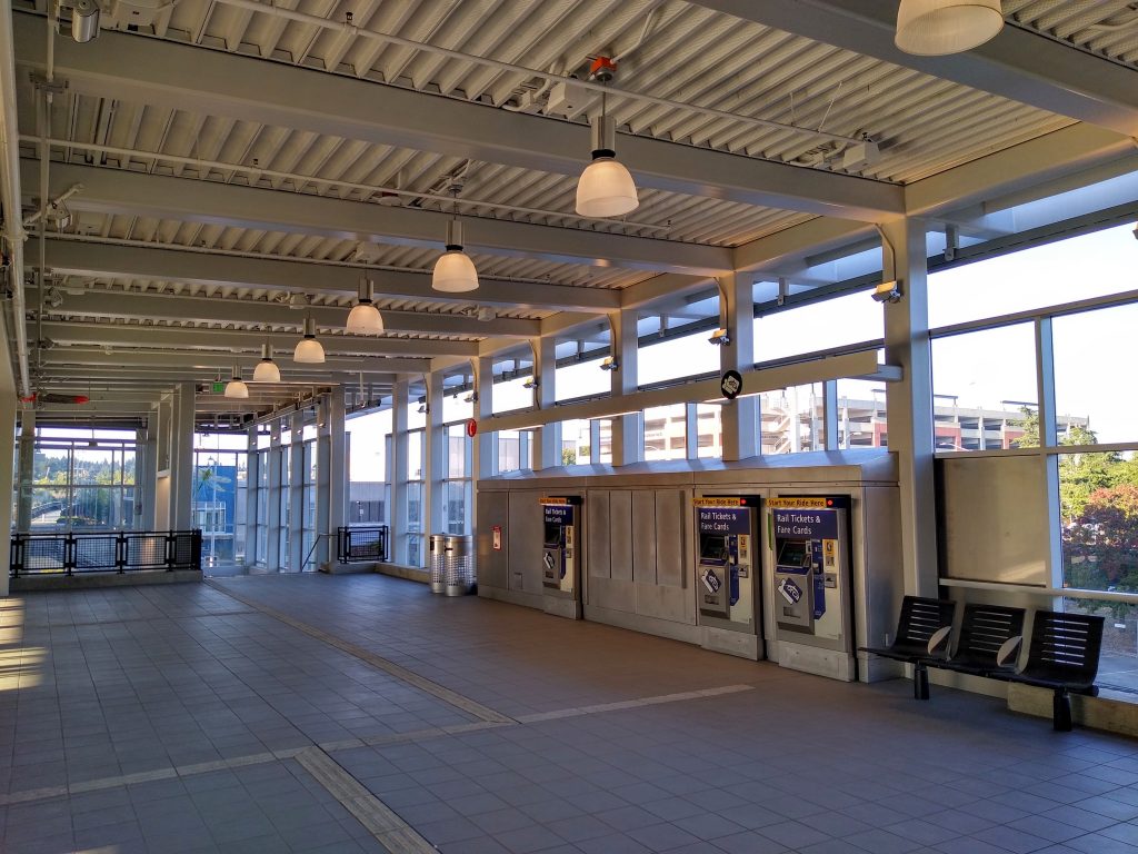 Station mezzanine with ticket vending machines and seating