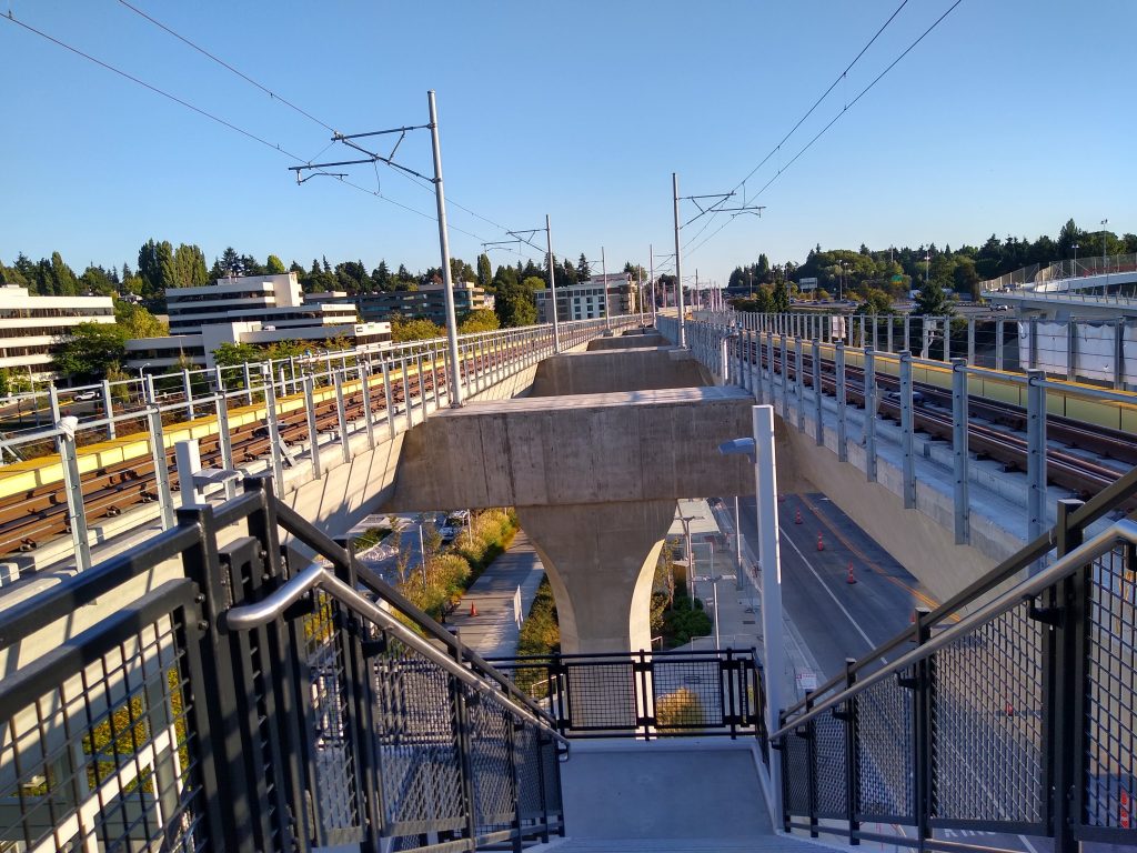 Stairway between train tracks 