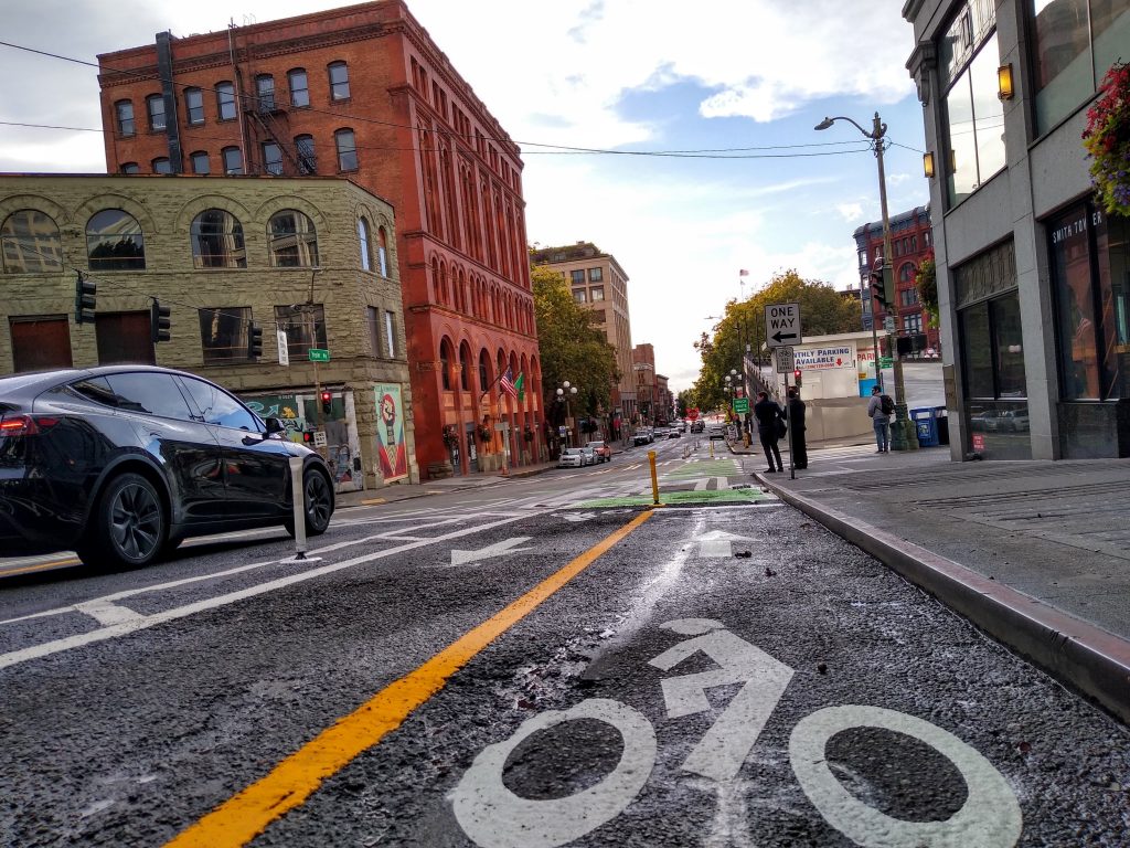 Low shot of a bike lane with historic buildings