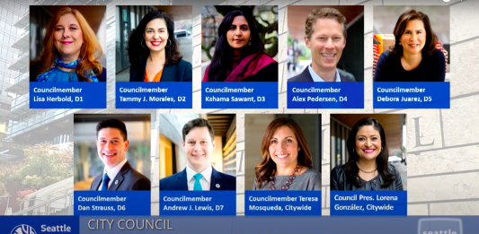 A screenshot of a virtual Seattle City Council meeting with photos of all nine councilmembers displayed.