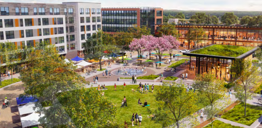 A rendering shows a green space next to a plaza with a fountain where people are gathering. The top portion of the rendering show six story mixed use building and another five story mixed use building. There is a small building with a green roof on the right side.
