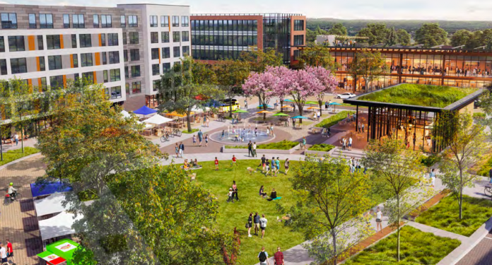 A rendering shows a green space next to a plaza with a fountain where people are gathering. The top portion of the rendering show six story mixed use building and another five story mixed use building. There is a small building with a green roof on the right side.