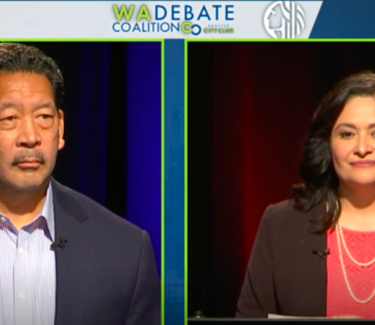 NPI Poll Finds Uphill Fight for Progressives in Seattle General Election A photo shows a man with greying black hair and mustache on the left side of the screen and a woman with shoulder length black hair and a red shirt beneath jacket on the right side of the stage.