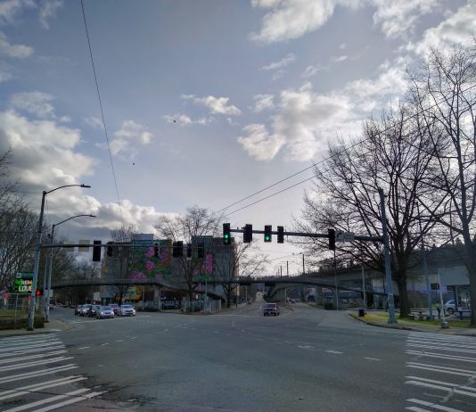 Durkan’s 2022 SDOT Budget Would Revive Downtown Streetcar, But Makes Few Waves A wide intersection where two streets meet at an angle, some legs without crosswalks.