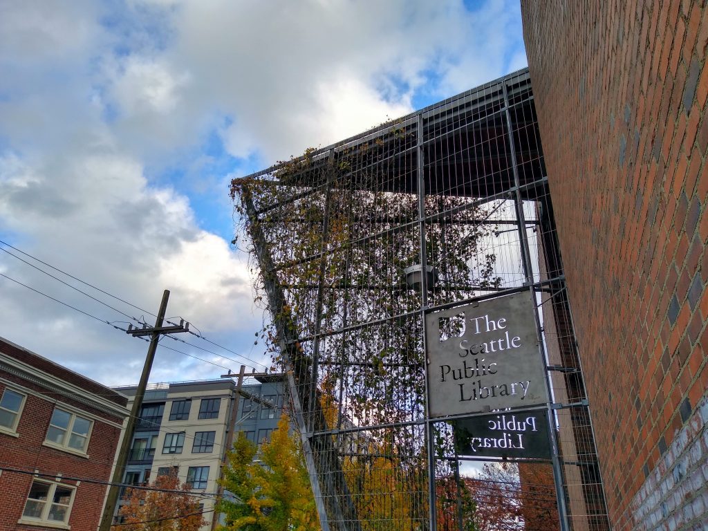 Exterior of Capital Hill Library with angled glass entry.