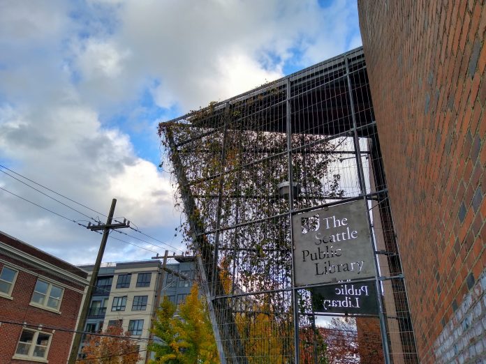 Exterior of Capital Hill Library with angled glass entry.