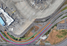 Port of Seattle Commission Taps Brakes on Arrivals Drive Expansion A photo shows an roadway leading to an airport terminal. Colors are used to identify where the roadway will be expanded.