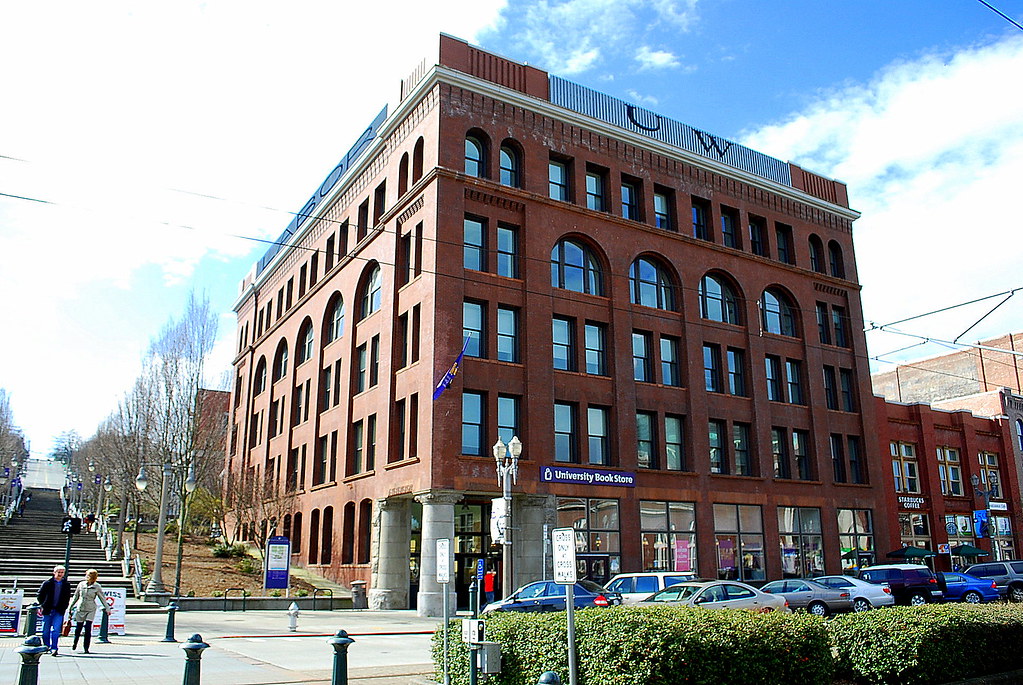 A photo of a five story brick building.