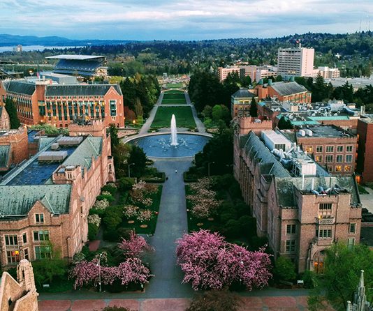 An Urbanist’s Guide to the U District Station Area Aerial photo of the University of Washington overlooking a fountain, with Rainier Vista at its center