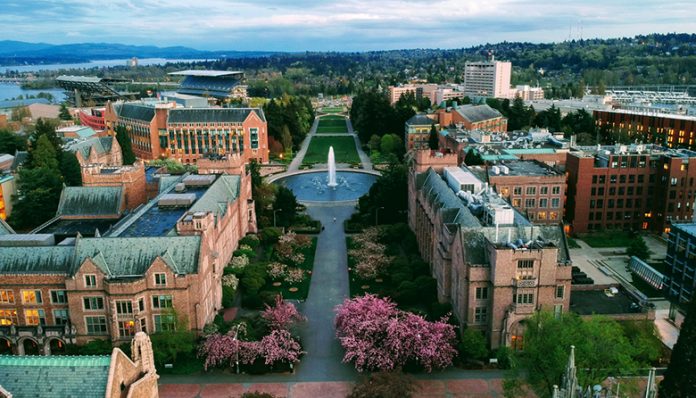 Aerial photo of the University of Washington overlooking a fountain, with Rainier Vista at its center