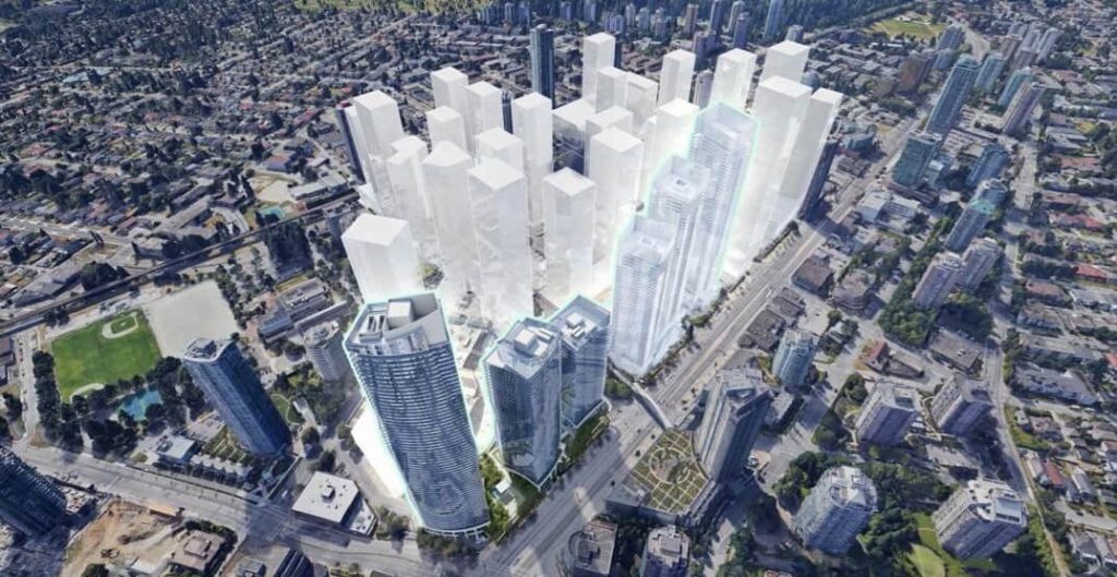 A rendering shows an aerial view of several proposed towers indicated by gray outlines filled in white in the middle of an urban landscape. 