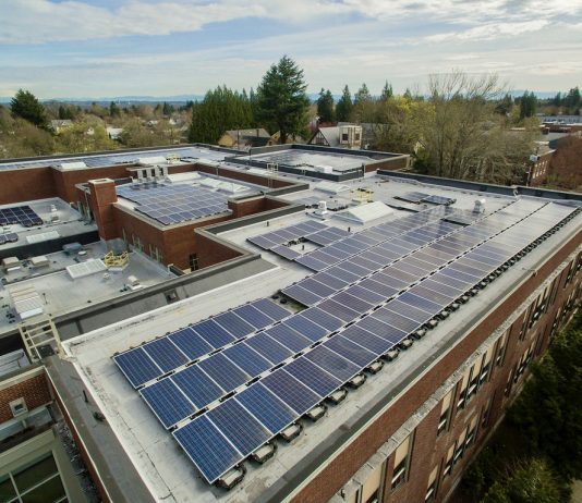 Push for Solar Schools Gaining Momentum A photo of a solar array on the rooftop of a school building.