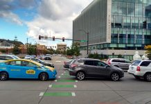 Seattle To Roll Out First Block-the-Box Camera Enforcement and Expand Transit Lane Cameras in 2022 A photo showing cars blocking a marked intersection for pedestrians.