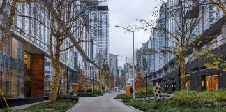 The 8th Ave N festival street surrounded by two newer office buildings, looking southward