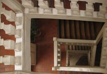 Seattle’s Lead on Single Stair Buildings A photo looking down a multi-level staircase