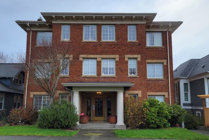 A brick apartment building.