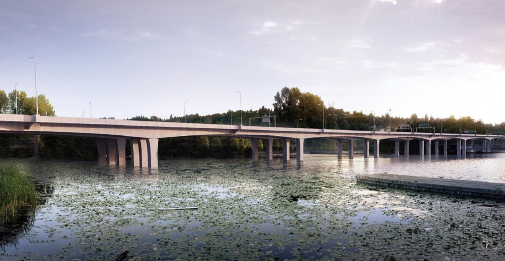 Side-by-side bridges on piers with marsh wetland in foreground and trees in the background