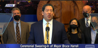 Harrell is flanked by his executive team including Deputy Mayors Kendee Yamaguchi and Monisha Harrell and Director of Strategic Initiative Tim Burgess to the right and Policy Director Dan Eder to the left.