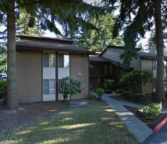 Rental Assistance, Conflict Mediation Slowing Evictions in Bellevue – For Now low-rise apartment building with trees