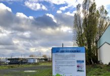 What We’re Reading: Pedestrian Streets, Equitable Congestion Pricing, and a New Park and Trail Connection A photo of a sign advertising the Georgetown flume park and trail connection in front of an empty lot.