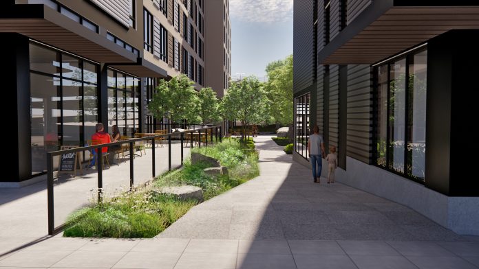 A rendering of the people walking into a courtyard in a modern apartment building.