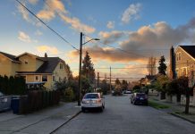 Seattle Times Wrong Again, Siding with Exclusion and Housing Scarcity The sunsets over Salmon Bay and trickles through clouds.
