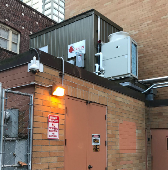 A photo of the commercial heat pump water heating systems installed at Bayview Tower. 
