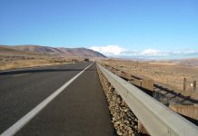 Washingtonians Oppose Funding for Highway Expansion, Poll Indicates A close up view of a highway in an arid landscape.