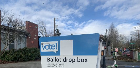 A photo of King County ballot drop box on a sunny day.
