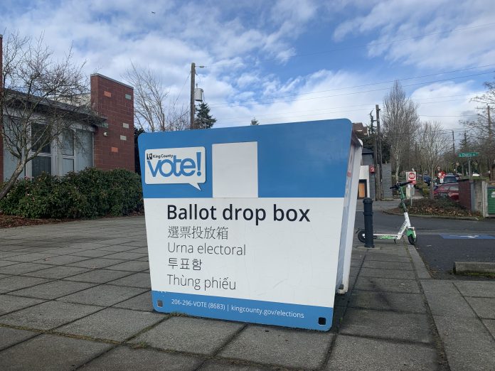 A photo of King County ballot drop box on a sunny day.