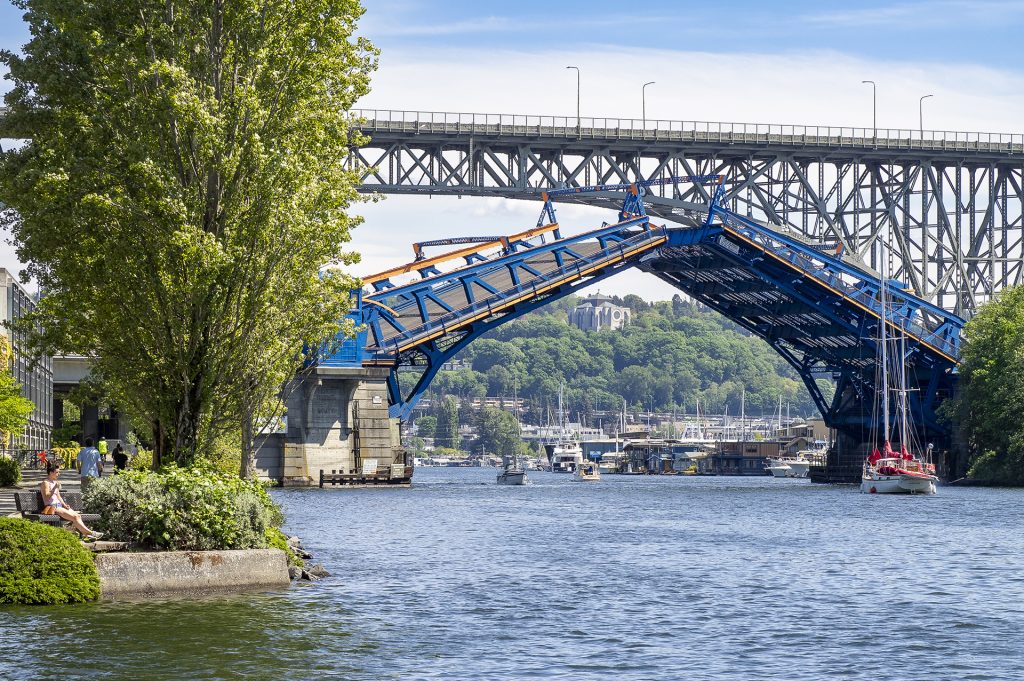 A photo of a raised bridge with another higher bridge in the background. 