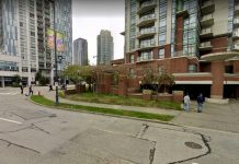 What We’re Reading: Zoning For Housing, Surrey Beats Vancouver, and Safer Cars A photo of a street with condo towers of different heights.