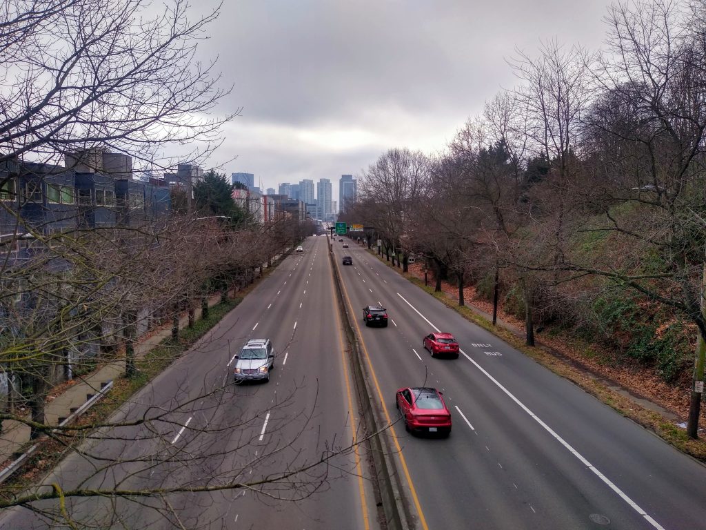 A photo looking down at a six lane urban highway.