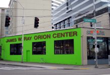 Freezing Temperatures Prompt Opening of Severe Weather Shelters Across King County A photo of a bright green building with the words James W Ray Orion Center written on it.