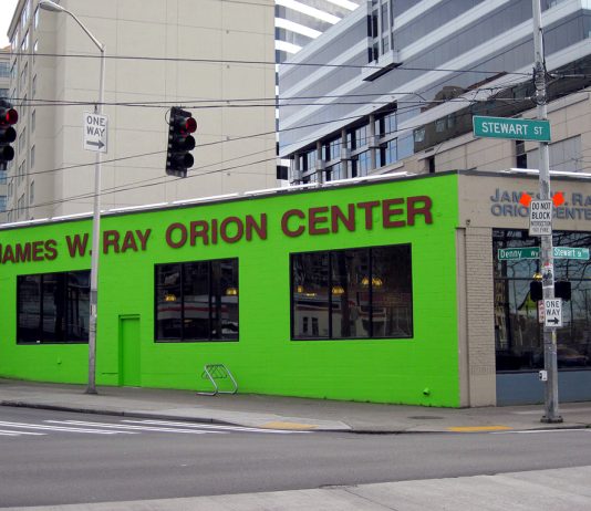 Freezing Temperatures Prompt Opening of Severe Weather Shelters Across King County A photo of a bright green building with the words James W Ray Orion Center written on it.