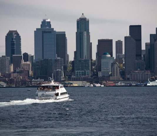 Transpo Notes: Bike Helmet Law Repeal, New Water Taxi Routes Report, Amtrak Cascades to Restore B.C. Service A photo of a water taxi in Elliot Bay near Downtown Seattle