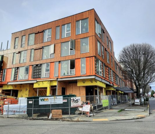 Seattle Reveals Rezoning Concepts and Invites Scoping Comments for Big 2024 Update A four-story building under construction.