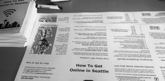 A black and white photo of a flyer instructing how to get online in Seattle.
