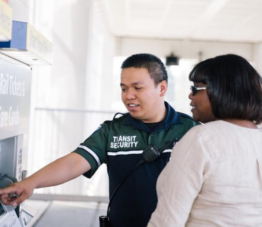 Sound Transit Board Passes Fare Reform Easing Nonpayment Penalties The rider pictured is a middle-aged Black woman.