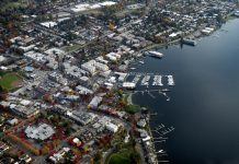 Master Builders’ Association Files Lawsuit Against New Kirkland Tree Codes an aerial view of Kirkland showing the downtown near the waterfront and some close by residential neighborhoods.