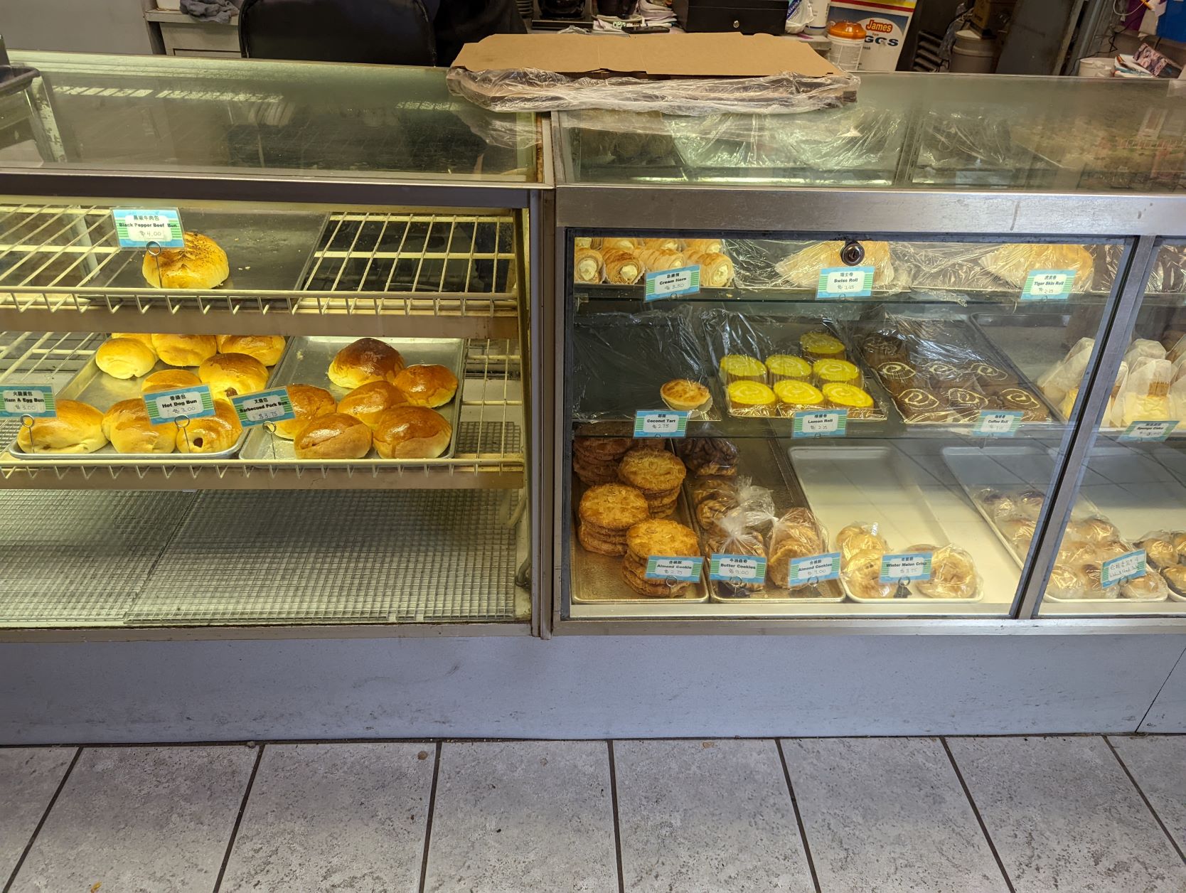 A display case with Chinese baked goods
