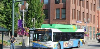 A Route 1 bus stops next to the University of Washington Tacoma campus.