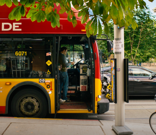 Transpo Notes: Fare Free Transit for Youth, Agencies Push for New Hires, Federal Funds for Sound Transit and Amtrak A man boards a rapid ride bus in Seattle